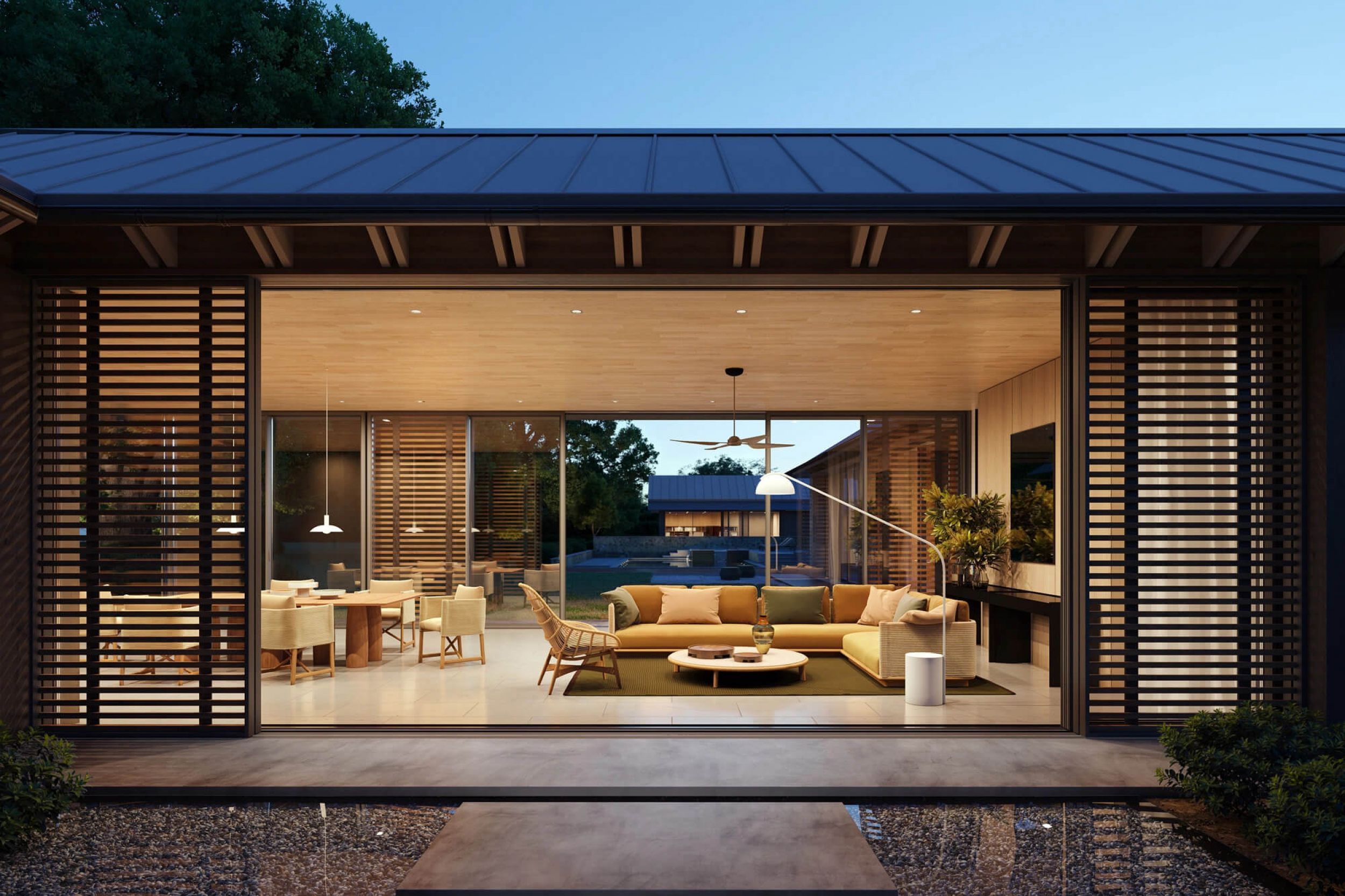 Table de repas extérieur en teck et en céramique aux lignes généreuses collection Giro par Kettal à Nice