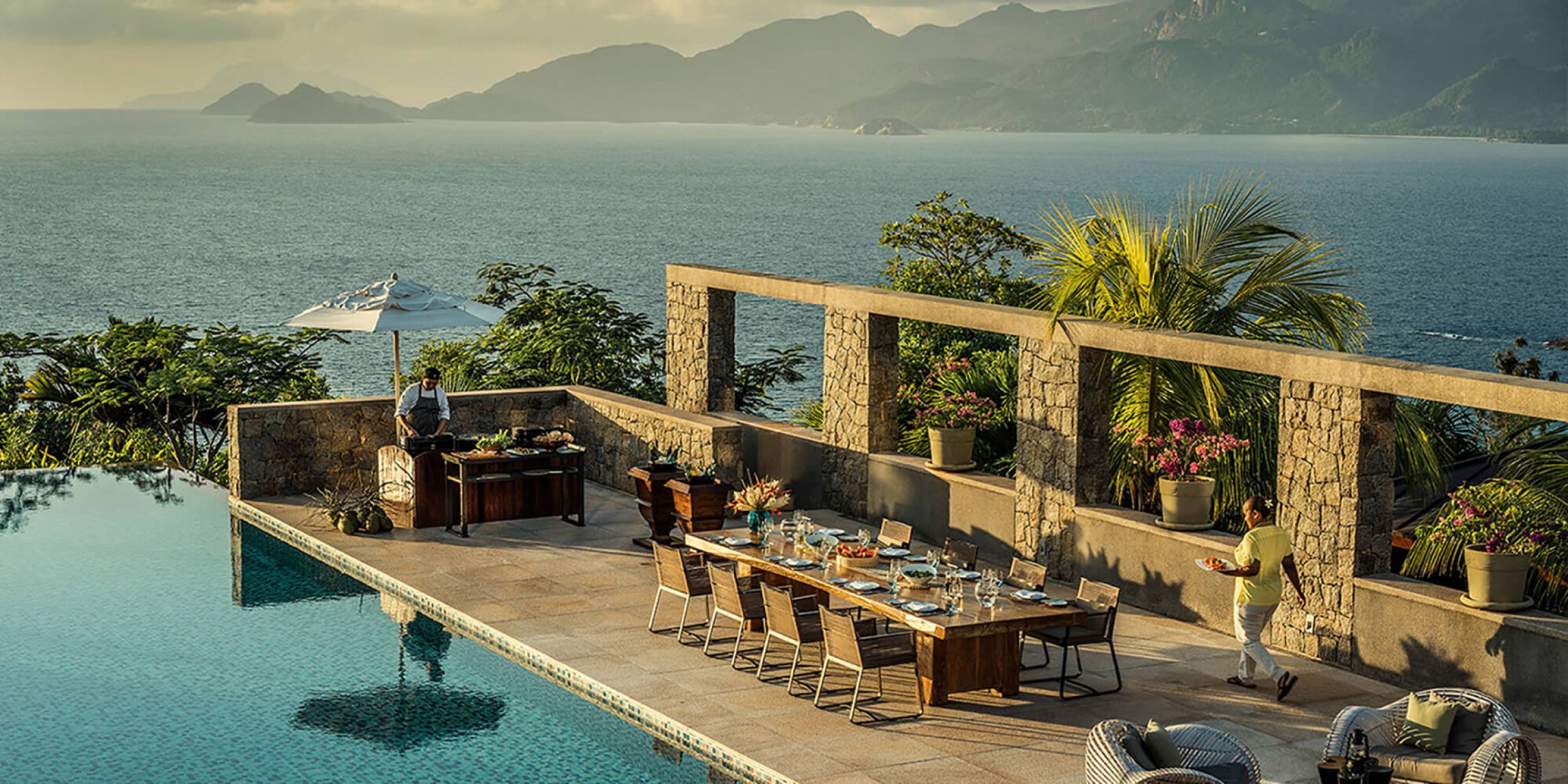 Fauteuil de repas en aluminium thermolaqué au design épuré de la collection Landscape par Kettal  à Porto Vecchio