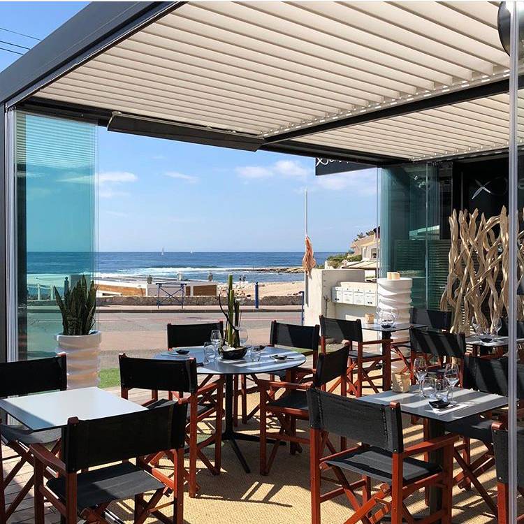 Lames orientables et motorisés de la pergola bioclimatique par MOOD DESIGN à Cannes