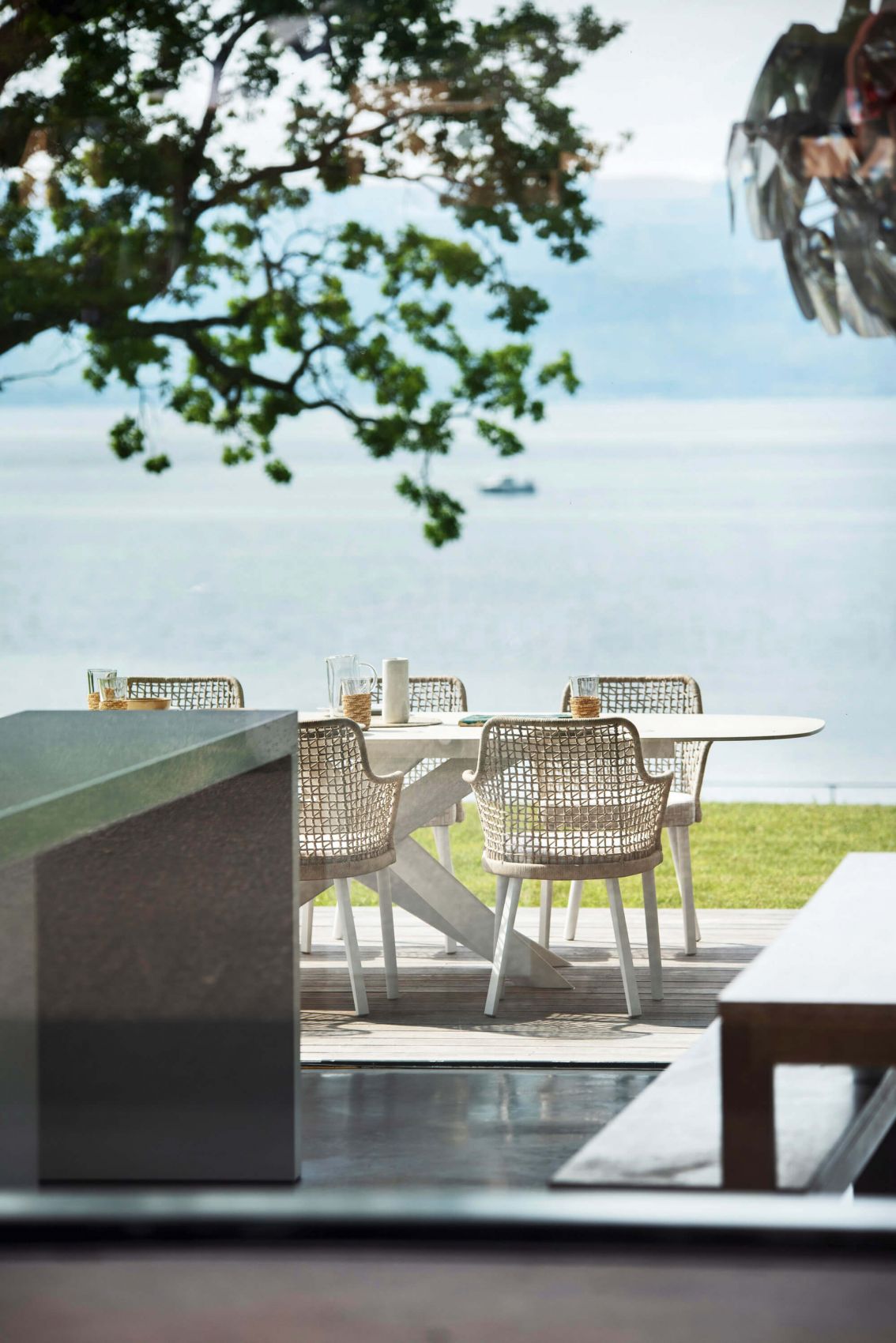 Fauteuil de repas design avec le dossier en cordes tressées collection Emma par Varaschin