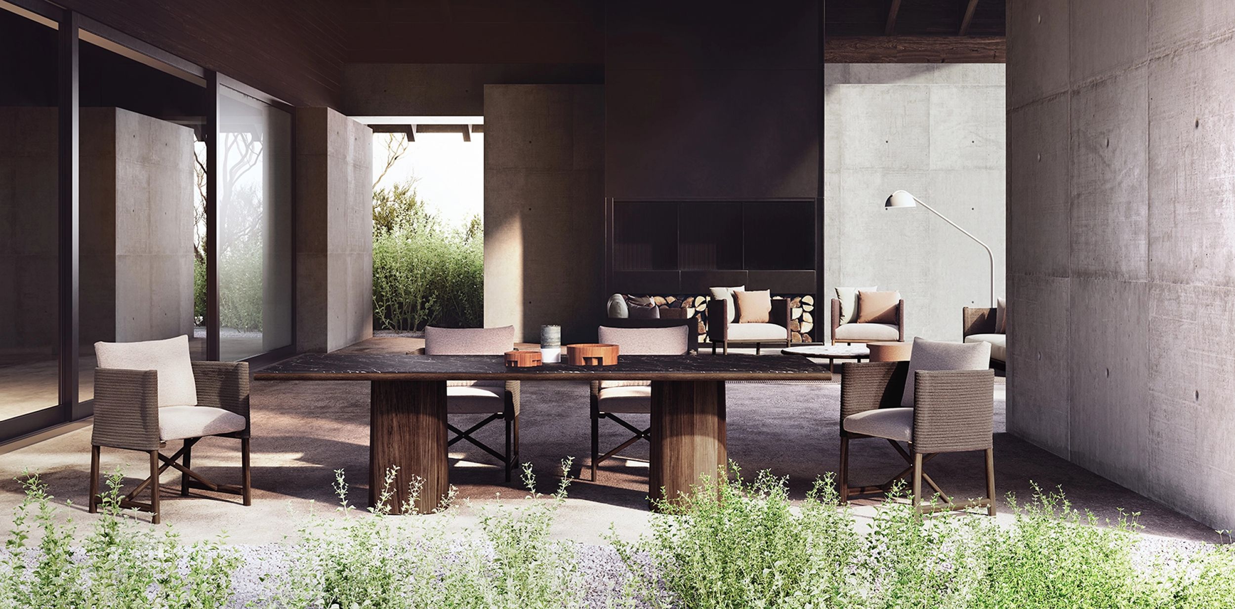 Table de repas extérieur en teck et en céramique aux lignes généreuses collection Giro par Kettal à Paris