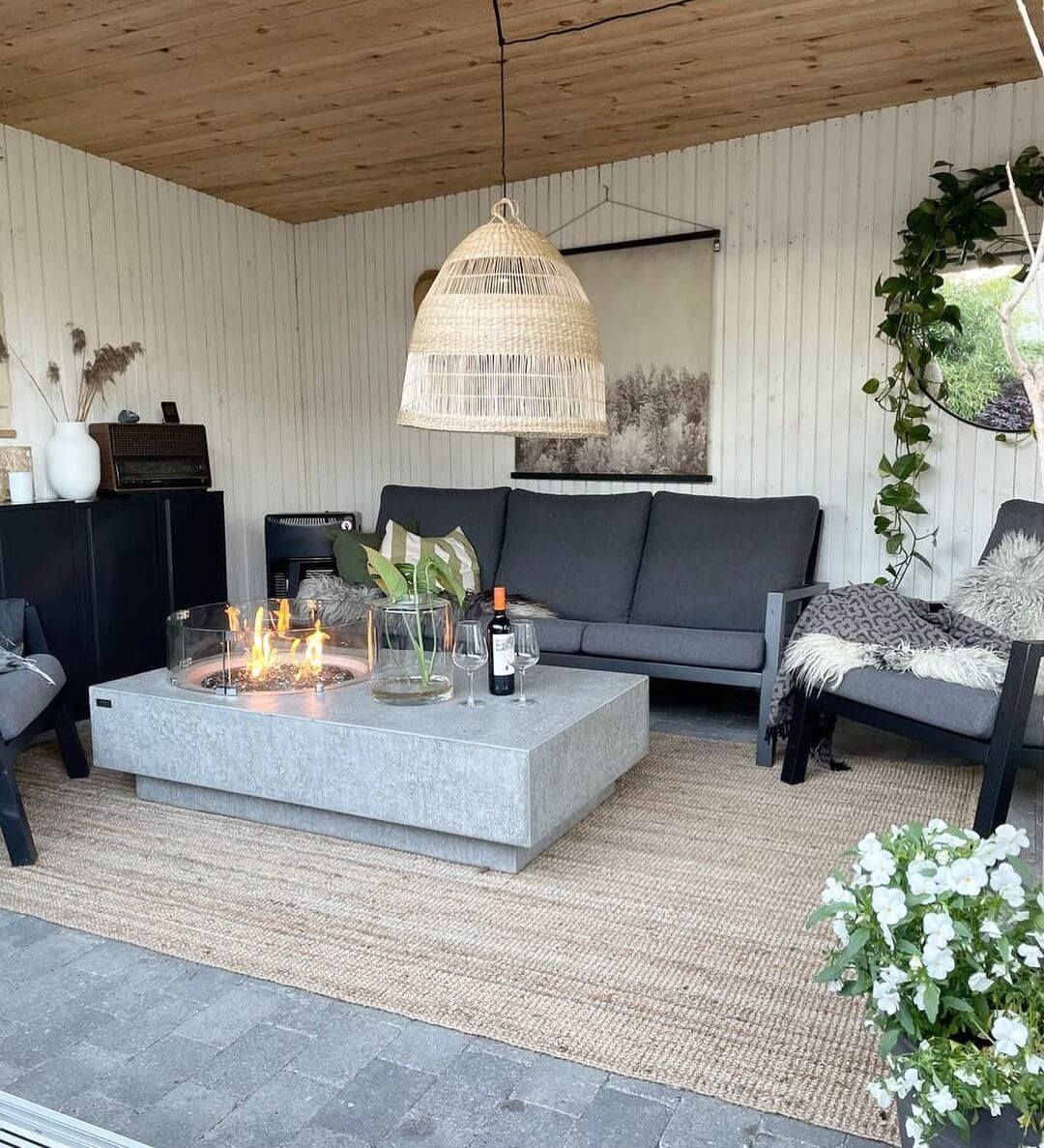 Table braséro chaleureux collection Métropolis en béton ciré