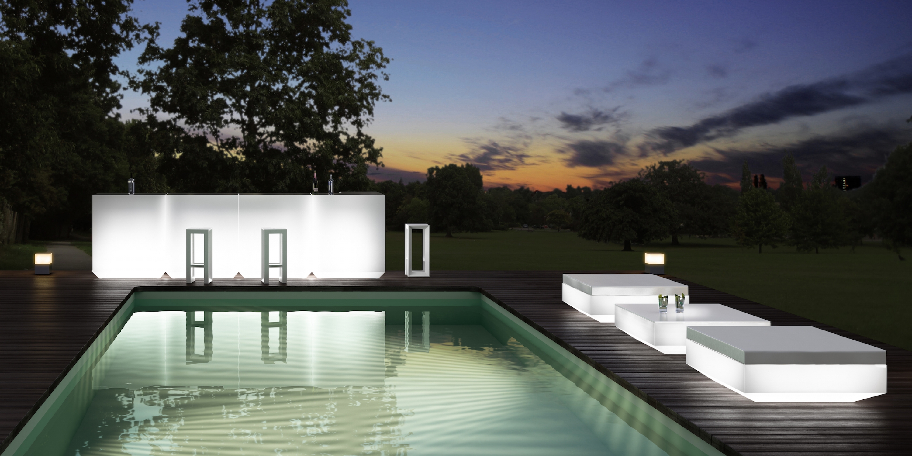 Table basse, bar et pouf blanc de la collection Vela par Vondom à Nice